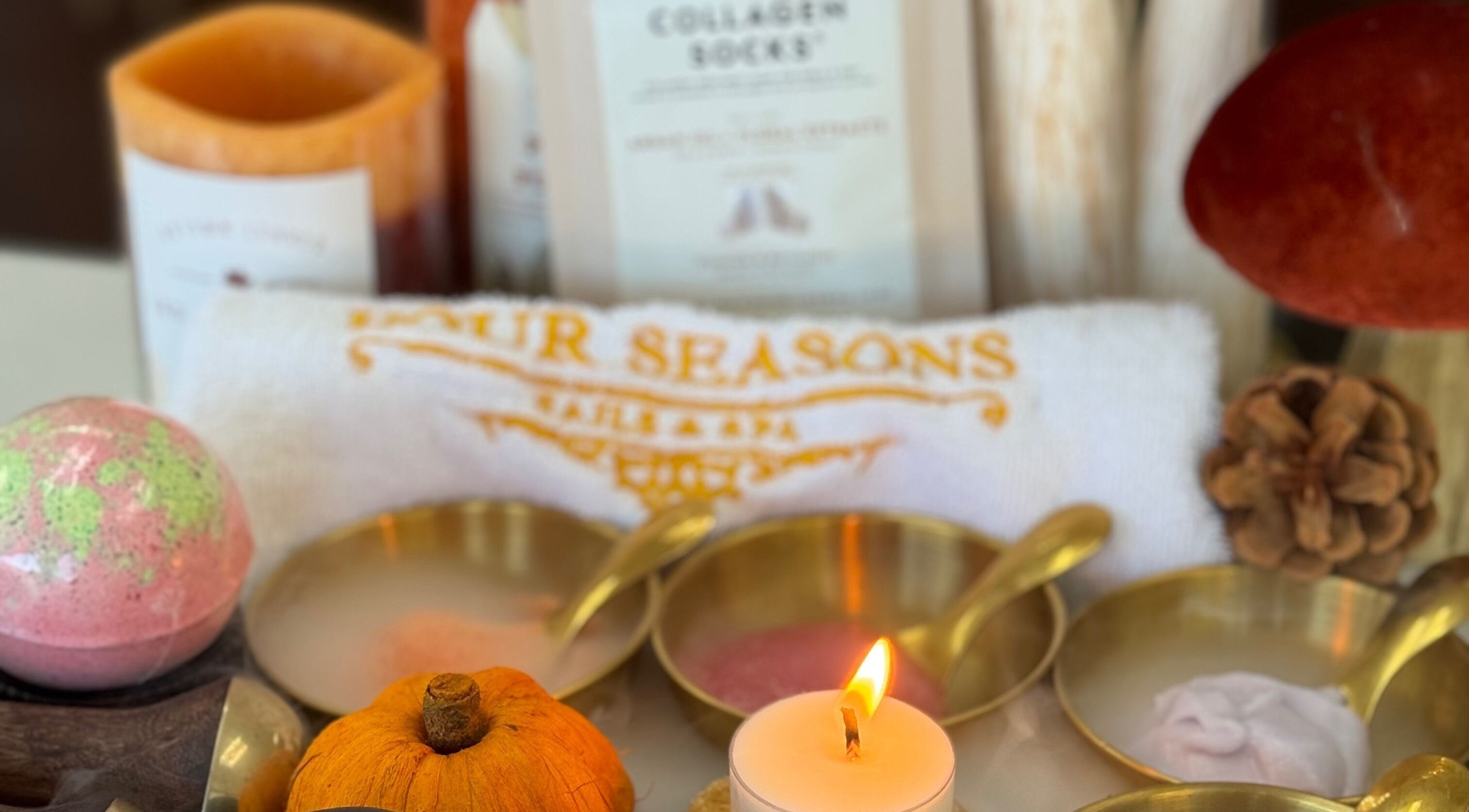 Relaxing spa setting at Four Seasons Nails and Spa Sherwood in Sherwood, Oregon, US with candles and bath bombs.