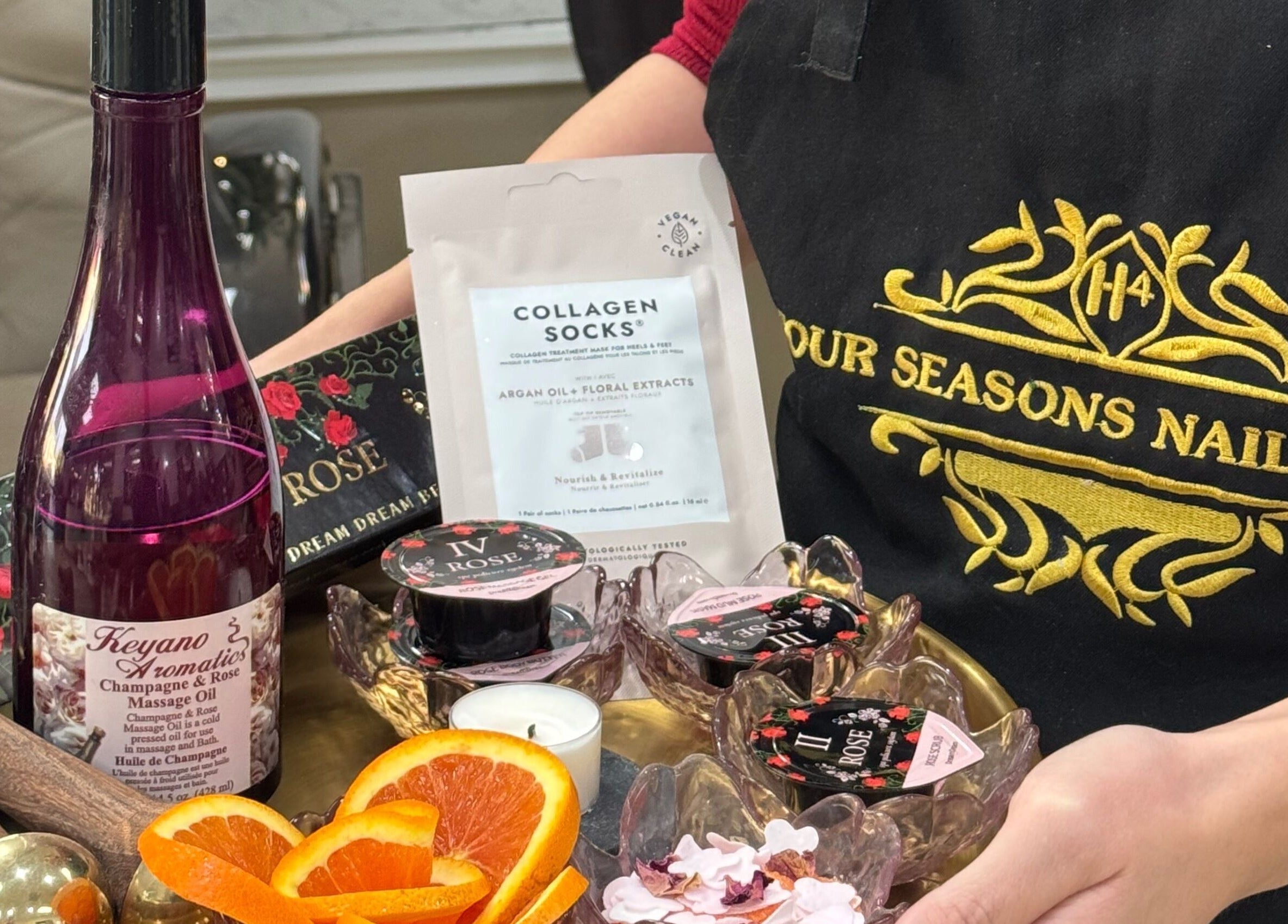 Luxurious spa tray at Four Seasons Nails and Spa Sherwood in Sherwood, Oregon, US, featuring massage oil and beauty products.