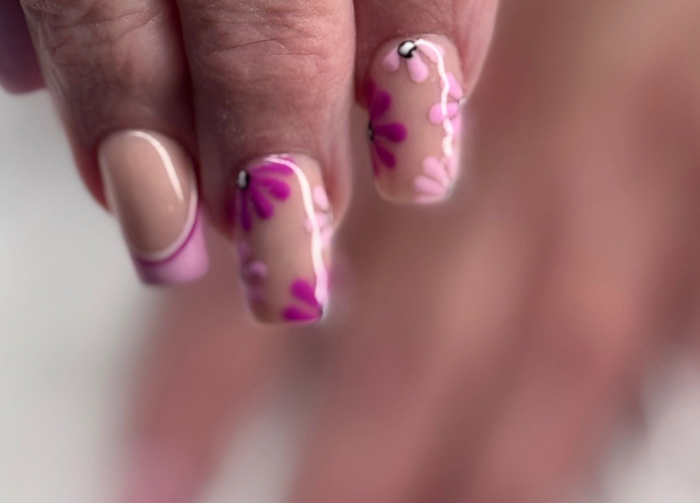 Close-up of floral nail art at Four Seasons Nails and Spa Sherwood, Sherwood, Oregon, US.