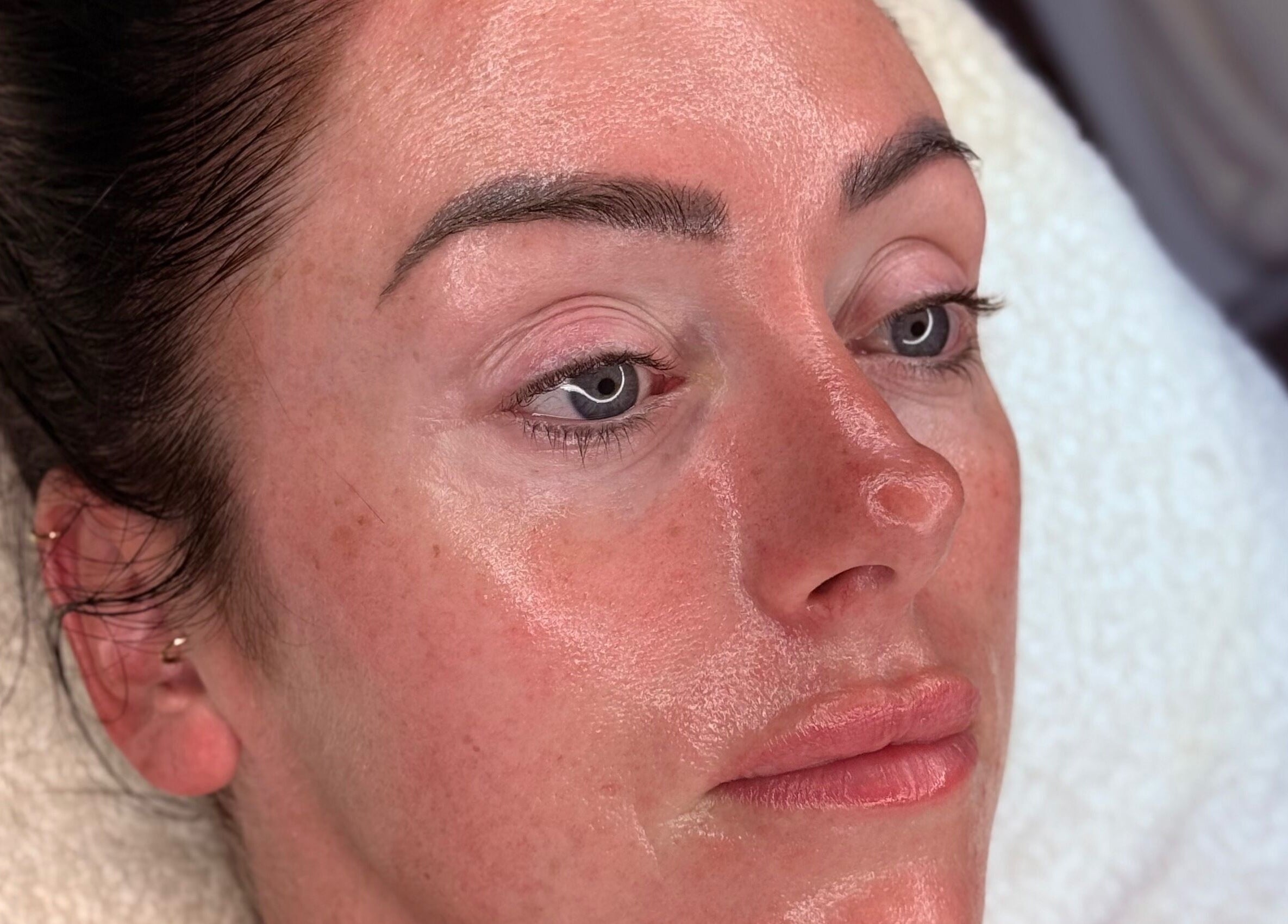 Relaxed, glowing face after treatment at The NUE Edit @ Fine Strokes, Chadderton, Oldham, England, GB.