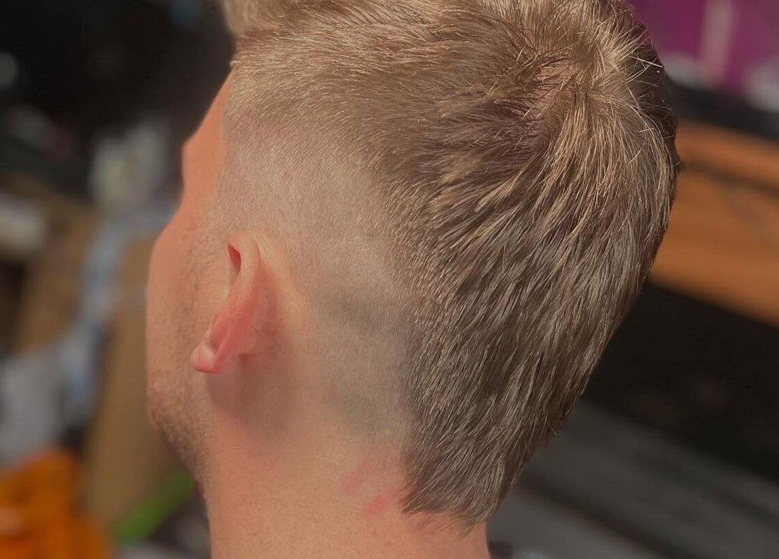 Trendy men's haircut at Bendall Beauty in Farnborough, England, GB offers sleek style and fresh look.