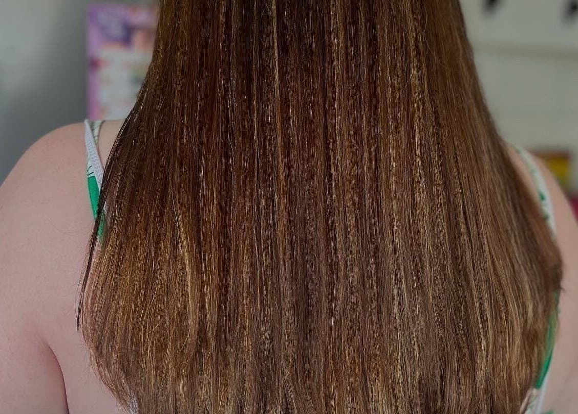 Sleek brunette hairstyle at Bendall Beauty, Farnborough, England, GB. Experience premium hair treatments.