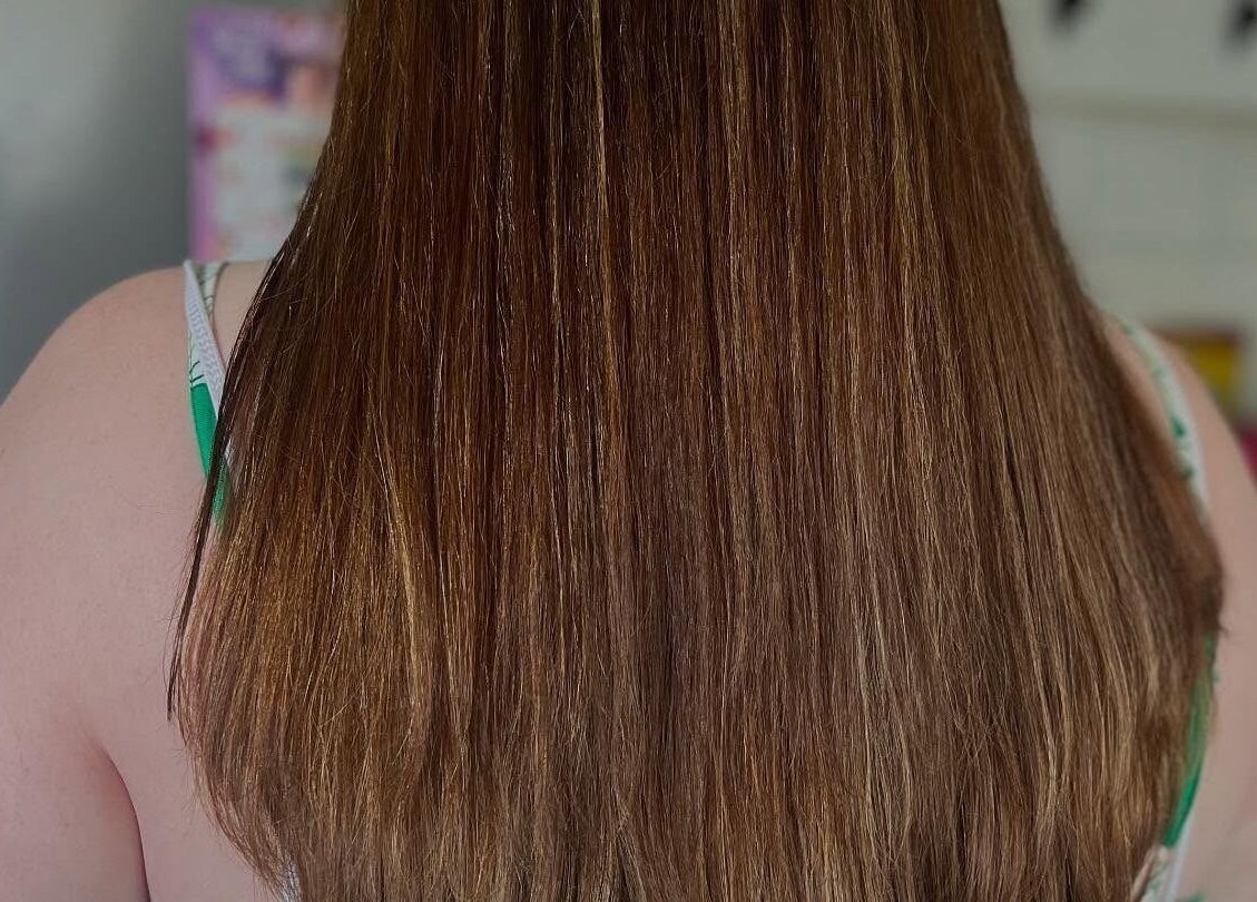 Sleek brunette hairstyle at Bendall Beauty, Farnborough, England, GB. Experience premium hair treatments.