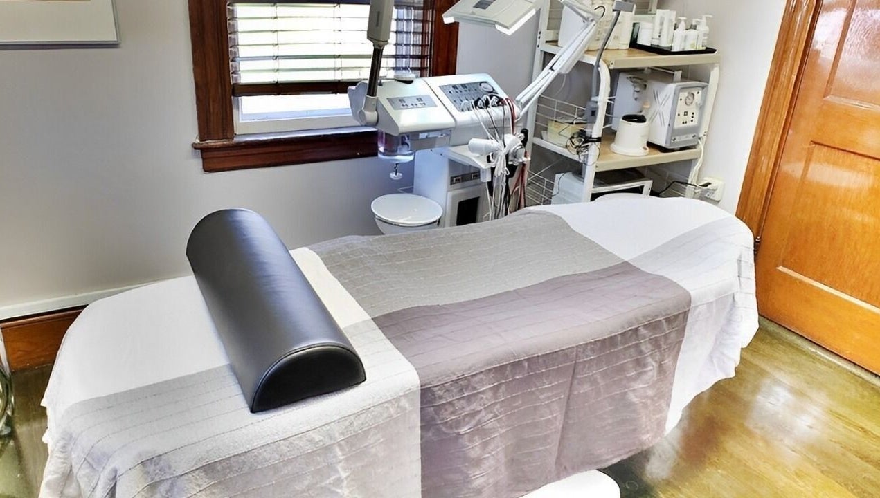 Calm treatment room at Skin Deep Skin in Quincy, Massachusetts, US, showcasing a comfortable spa bed.