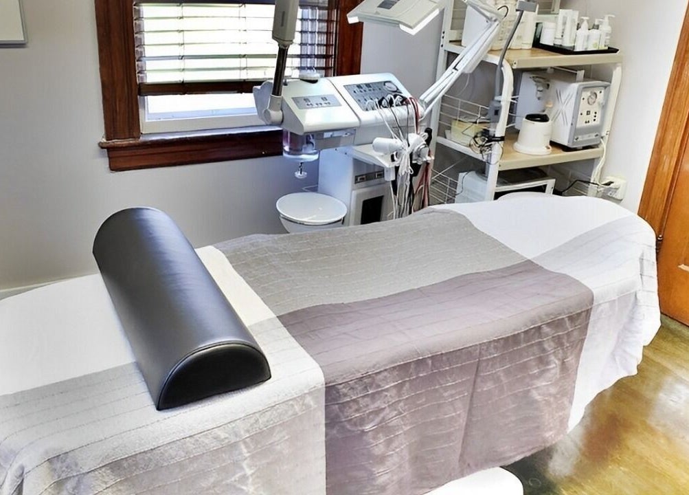 Calm treatment room at Skin Deep Skin in Quincy, Massachusetts, US, showcasing a comfortable spa bed.