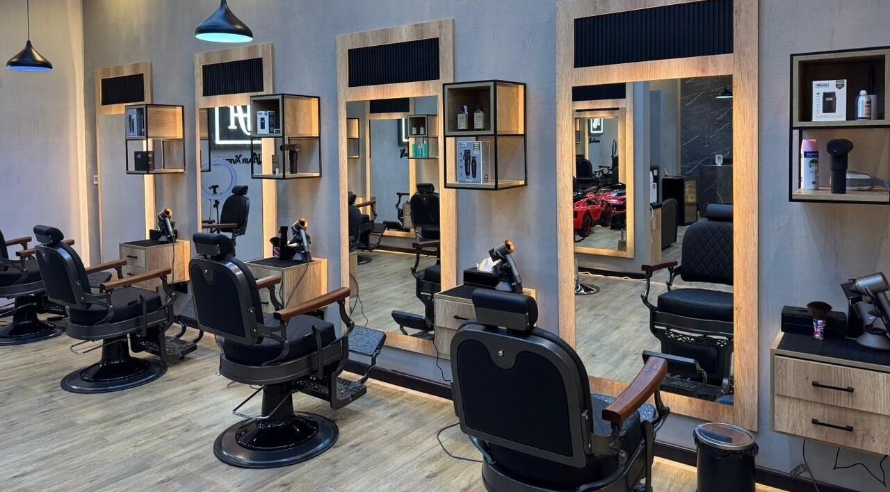 Modern interior of Hair Avenue Gents Salon, elegant barber chairs, sleek mirrors in Dubai, Dubai, AE.