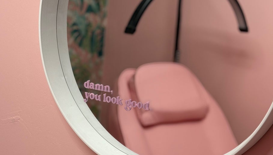 Chic pink beauty room with motivational quote at What the Fluff! Lashes & Brows, Nottingham, England, GB.