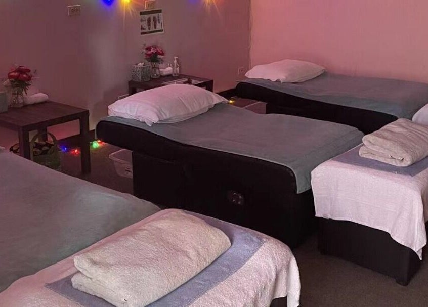 Cozy massage beds at AA Foot & Body Spa in Lisle, Illinois, US, enhance your relaxation experience.