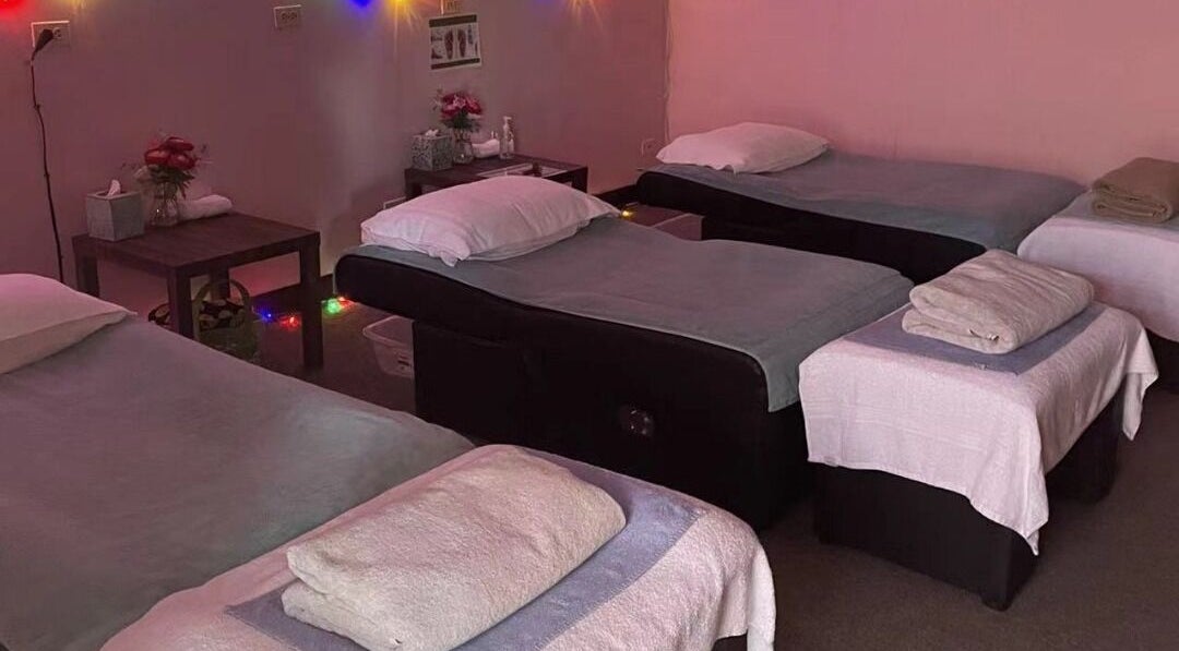 Cozy massage beds at AA Foot & Body Spa in Lisle, Illinois, US, enhance your relaxation experience.
