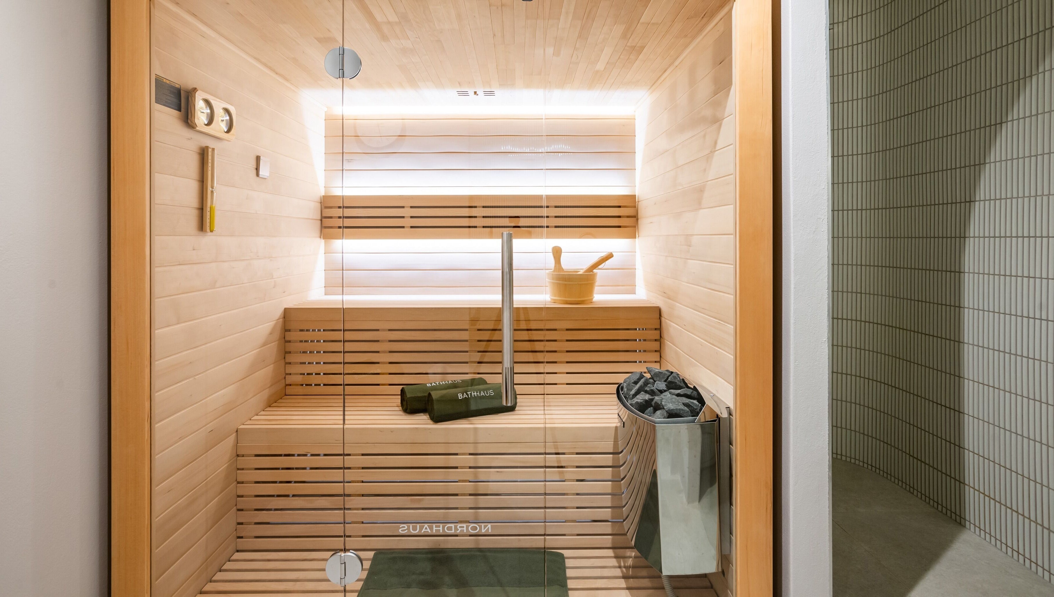 Luxurious sauna at Bath Haus Cronulla, Cronulla, New South Wales, AU, offering relaxation and wellness amenities.