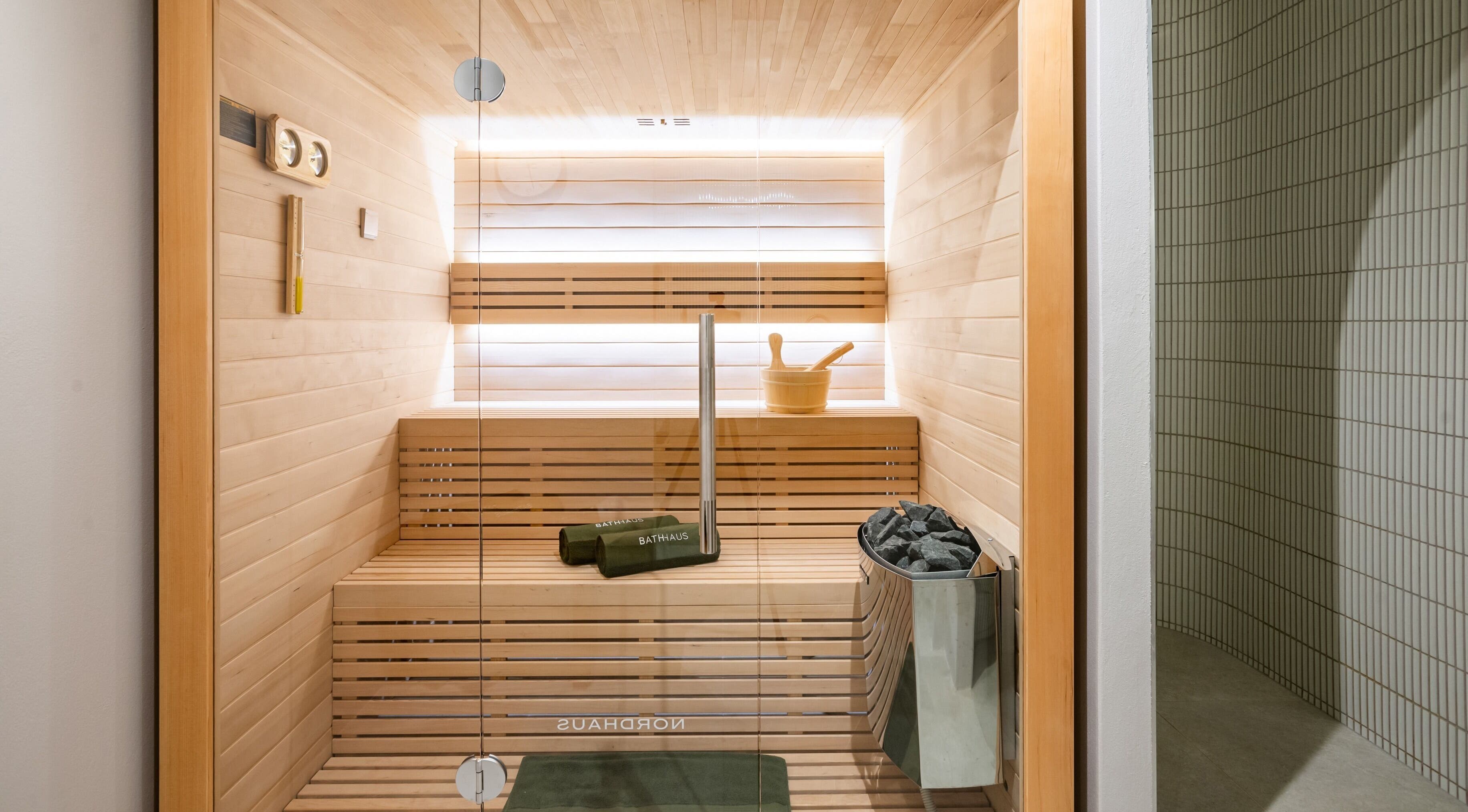 Luxurious sauna at Bath Haus Cronulla, Cronulla, New South Wales, AU, offering relaxation and wellness amenities.