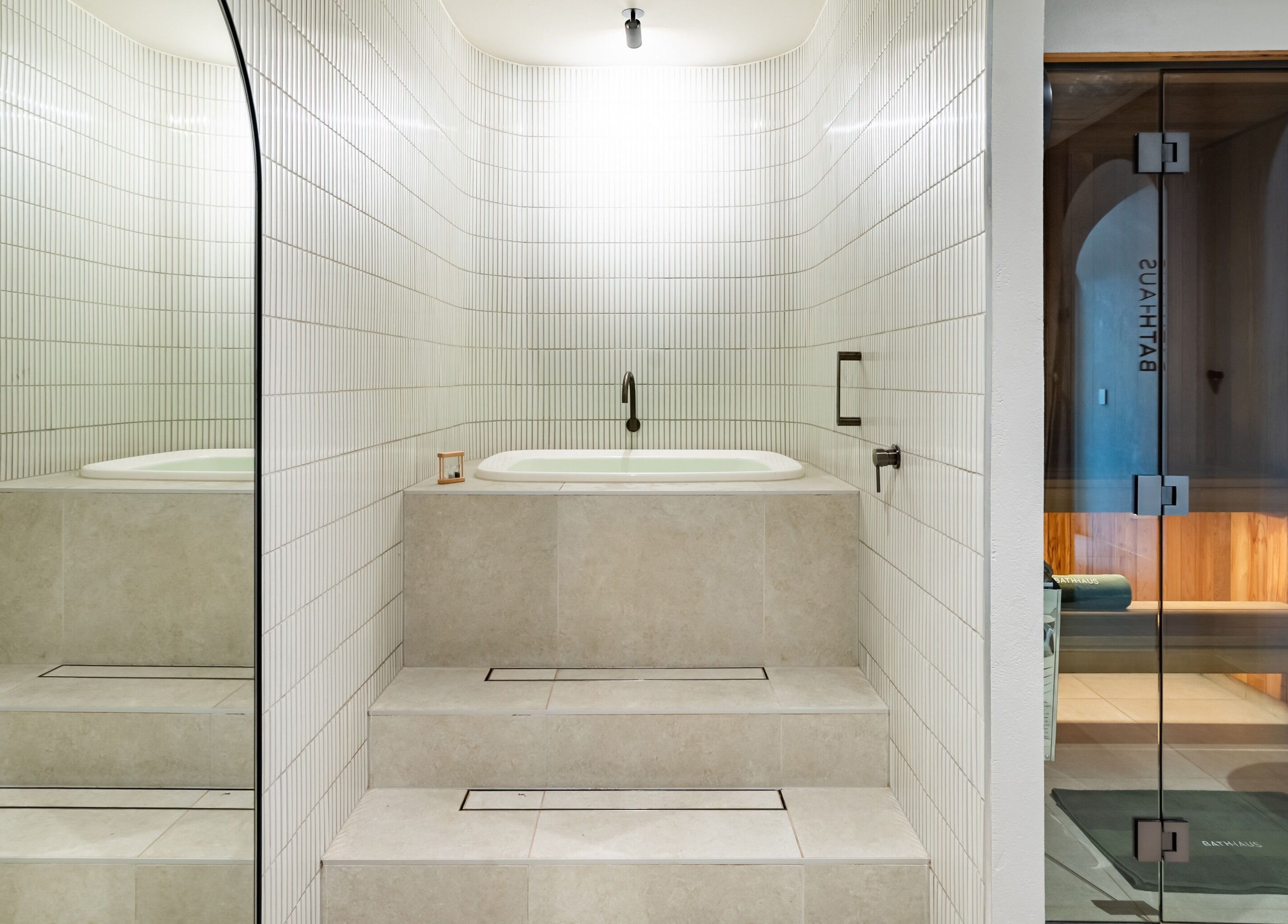 Modern soaking tub and sauna at Bath Haus Cronulla, Cronulla, New South Wales, AU.