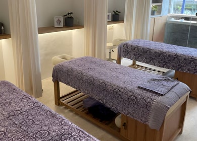 Luxurious massage beds in a tranquil therapy room at Muscle Works, Bali, Bali, ID.