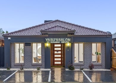 Front view of Yasu's Salon in Melbourne, Victoria, AU showcasing modern exterior with stylish entrance.