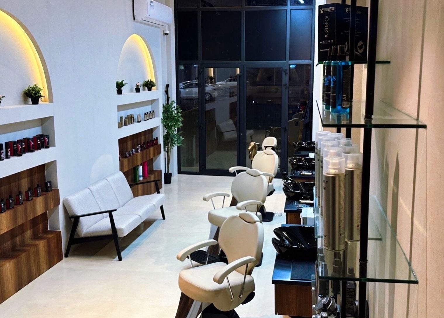 Elegant interior of Milli Trims in Saar, Al-muḥāfaẓat Aš-šamālīyah, BH with styling chairs and product displays.