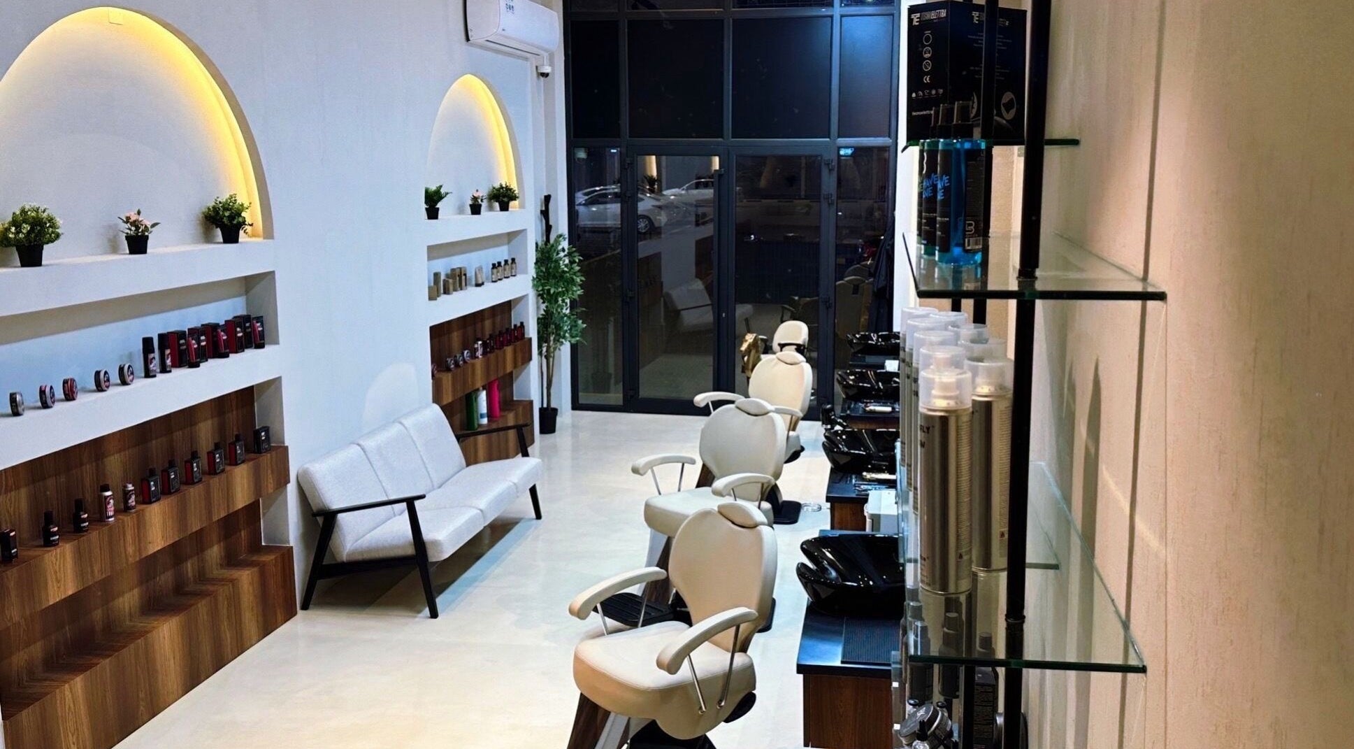 Elegant interior of Milli Trims in Saar, Al-muḥāfaẓat Aš-šamālīyah, BH with styling chairs and product displays.
