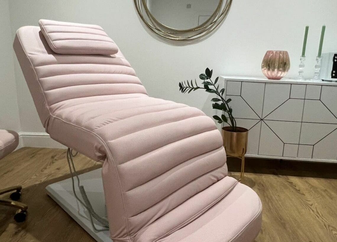 Pink padded beauty chair at You and Me - Nails by Dom, London, England, GB, set in a stylish, modern room.