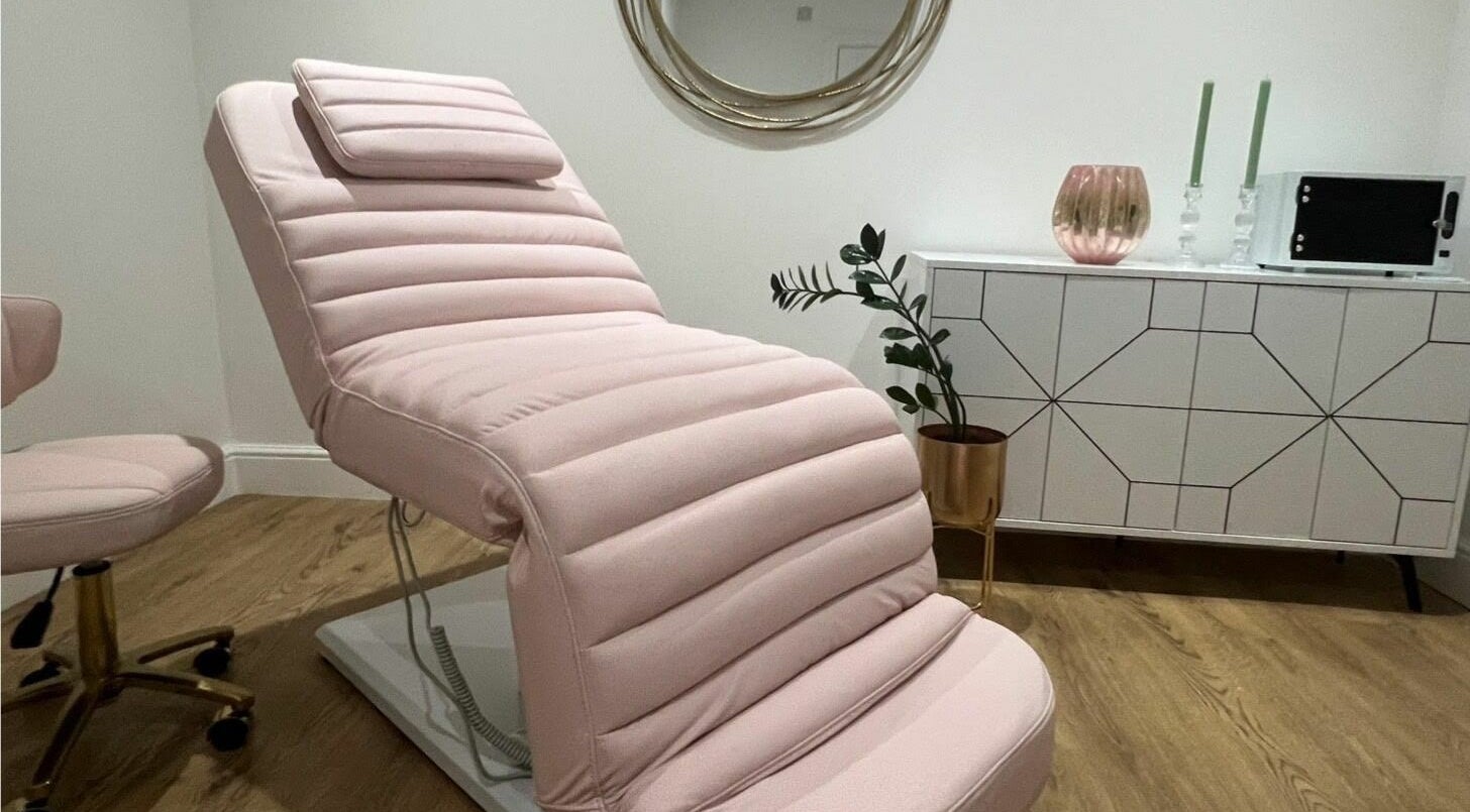 Pink padded beauty chair at You and Me - Nails by Dom, London, England, GB, set in a stylish, modern room.
