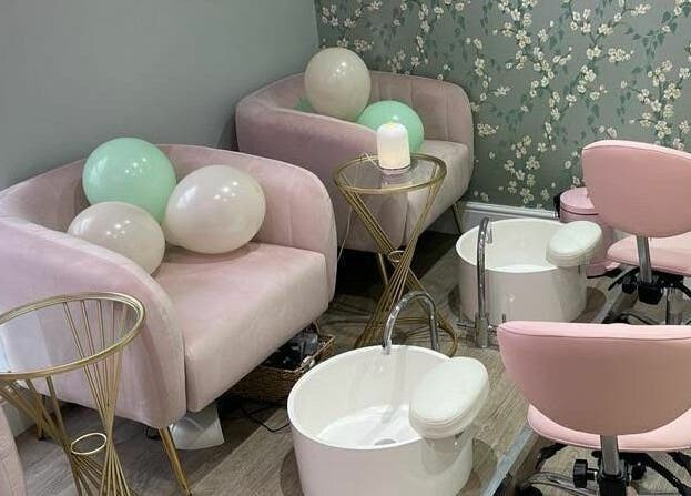 Cozy nail salon seating at You and Me - Nails by Dom, London, England, GB with plush chairs and serene ambience.