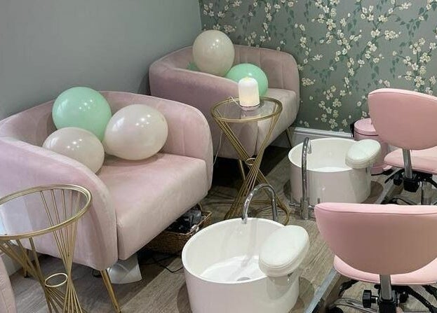 Cozy nail salon seating at You and Me - Nails by Dom, London, England, GB with plush chairs and serene ambience.