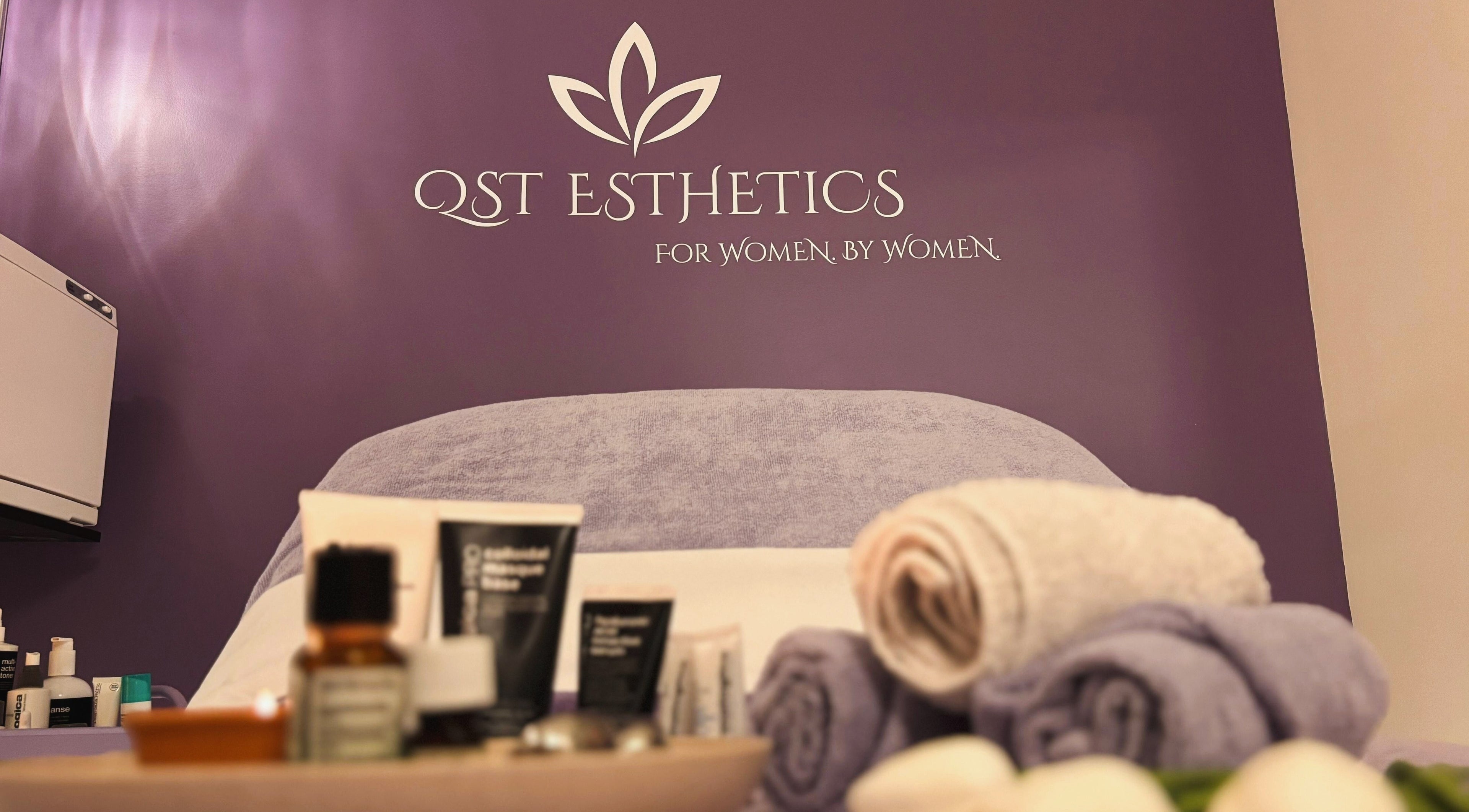 QST Esthetics - Facials and Massage in Ottawa, Ontario, CA offers a calming spa setting with lotions and towels.