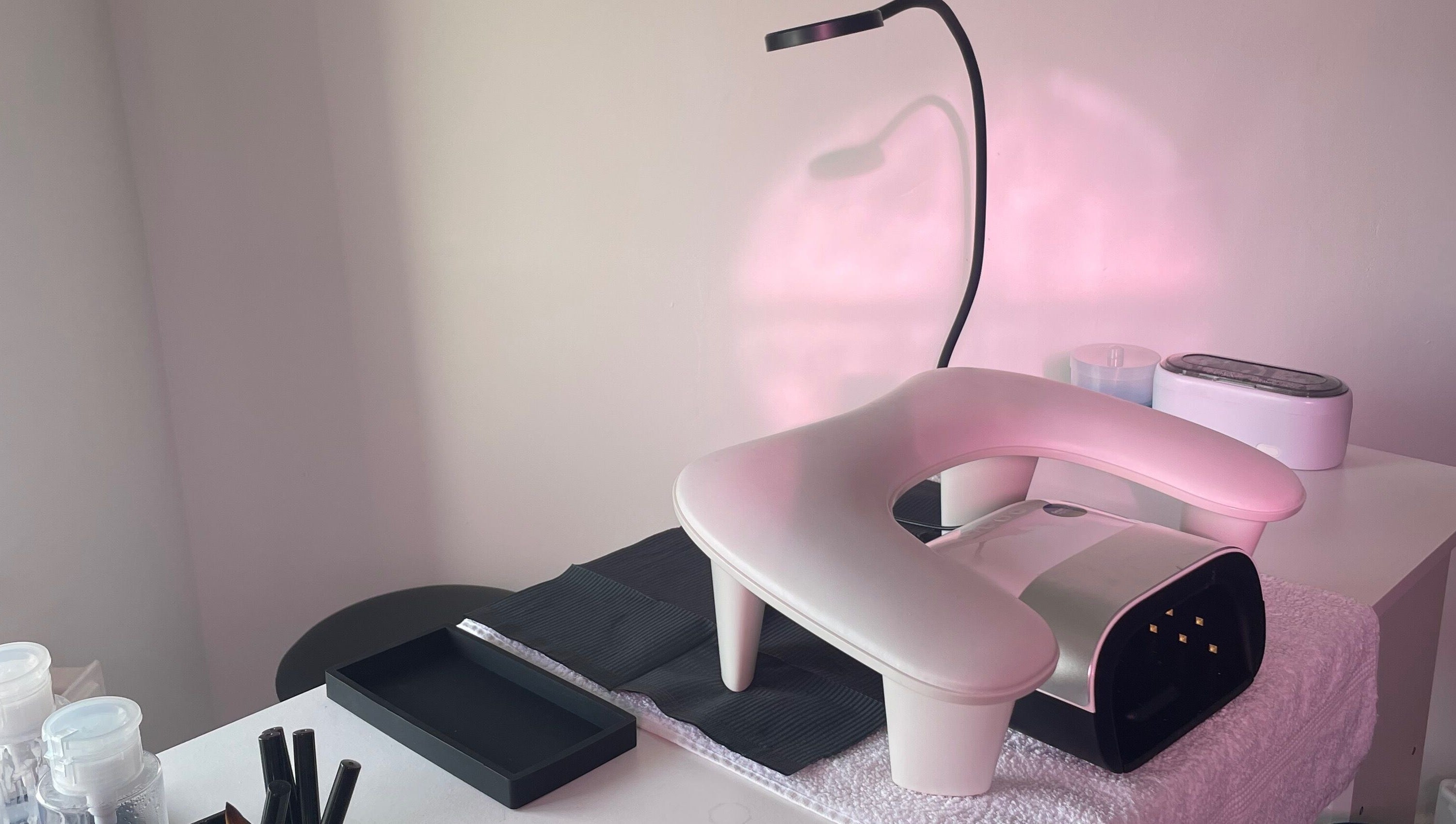 HLM Nails manicure setup with modern tools in Charfield, England, GB, showcasing a serene salon atmosphere.