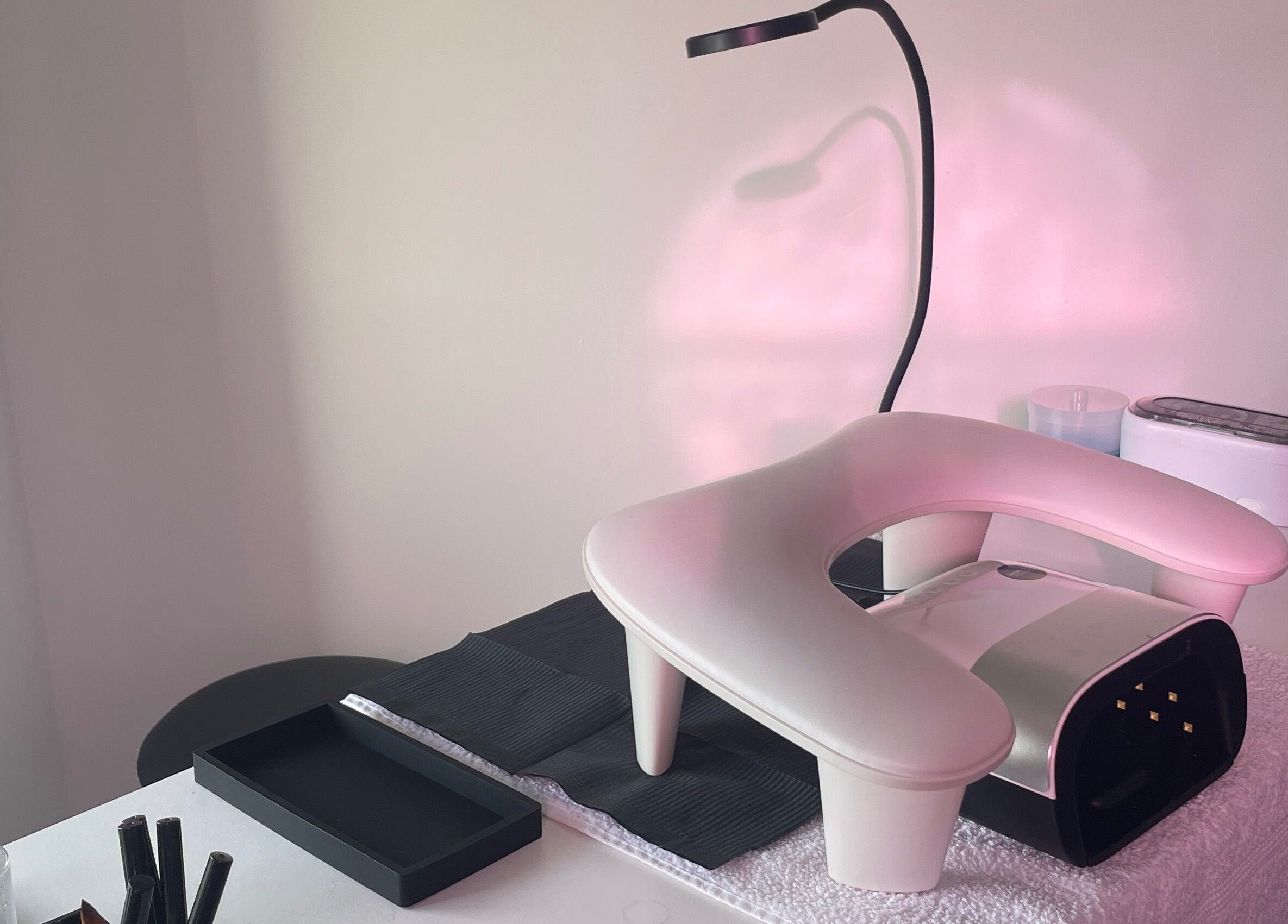 HLM Nails manicure setup with modern tools in Charfield, England, GB, showcasing a serene salon atmosphere.