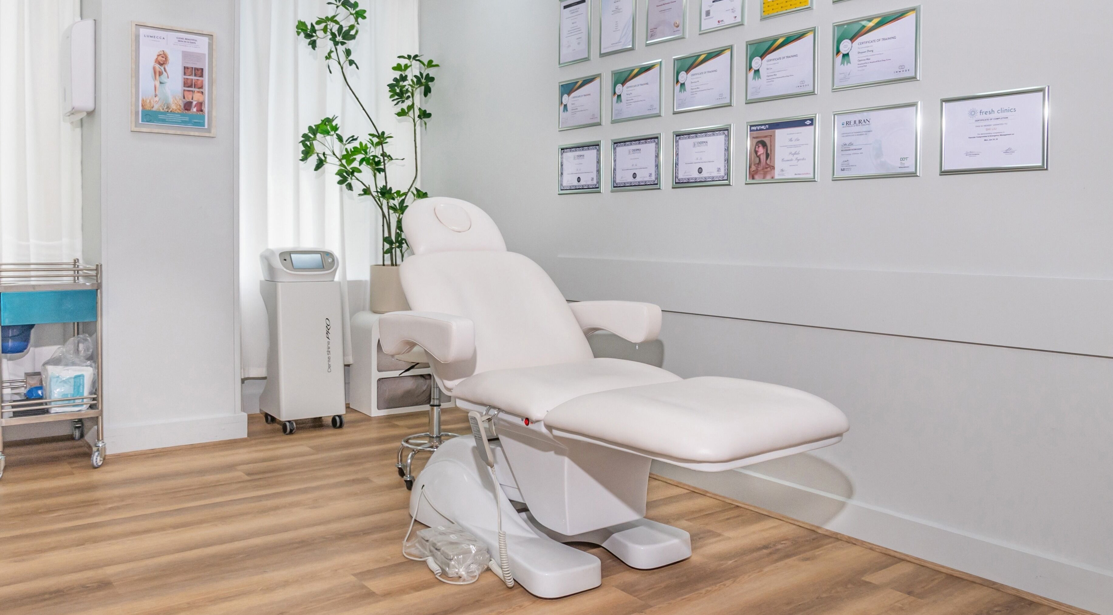 Modern treatment chair in NB&CO. (City) spa room, Melbourne, Victoria, AU, under glowing certificates.