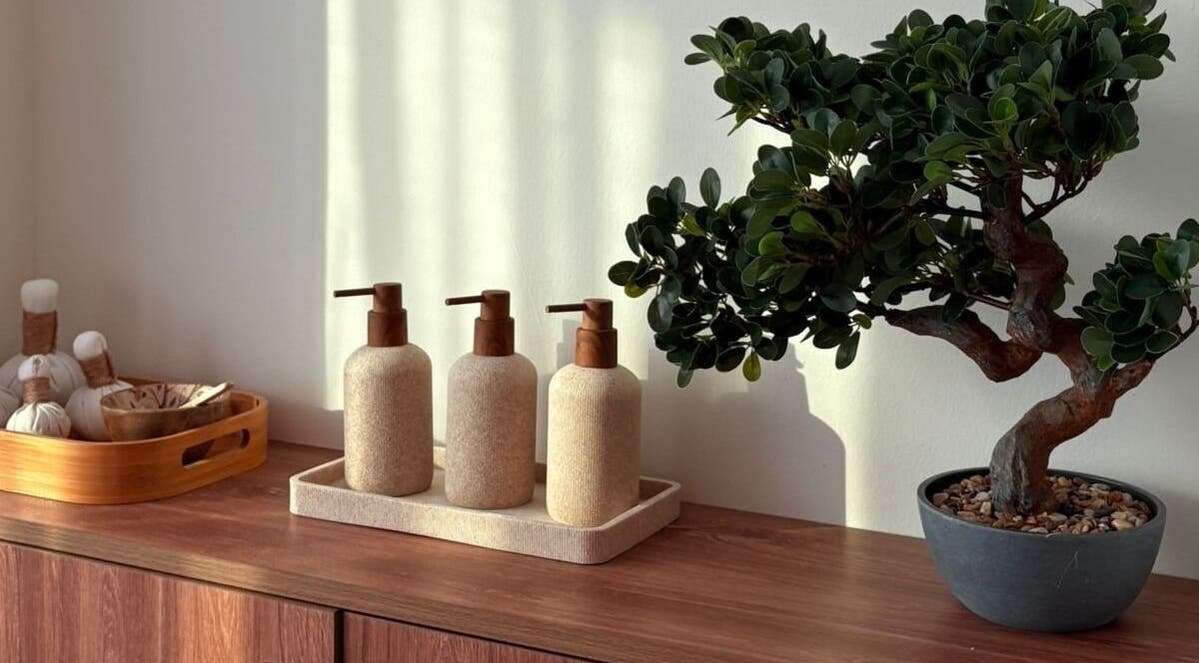 Elegant spa decor featuring soaps and a bonsai at Kenko Spa, Dubai, Dubai, AE.