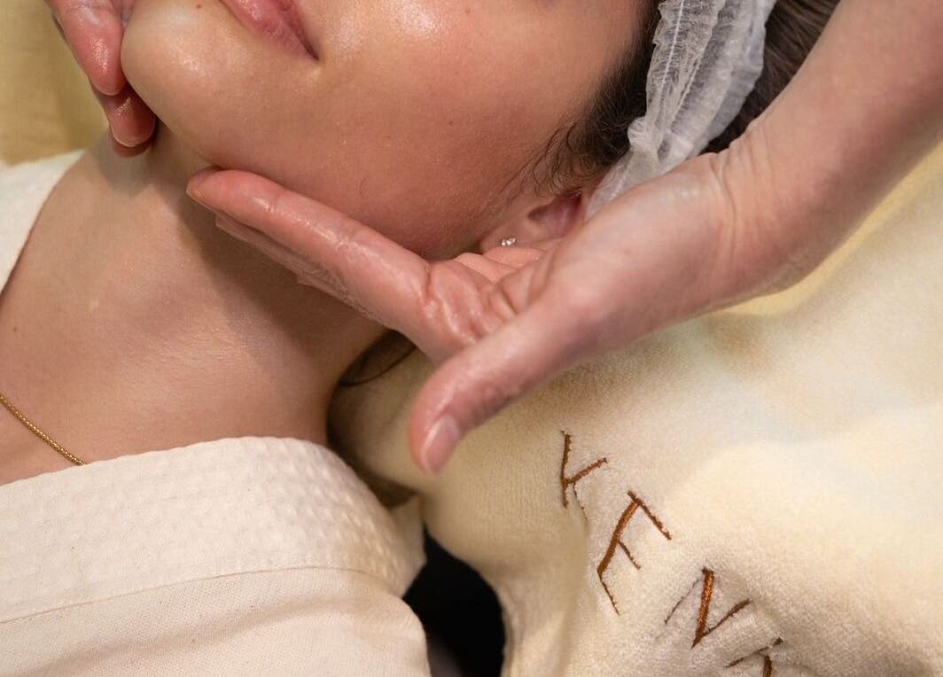 Relaxing facial massage at Kenko Spa, Dubai, Dubai, AE, promoting tranquility and skin rejuvenation.