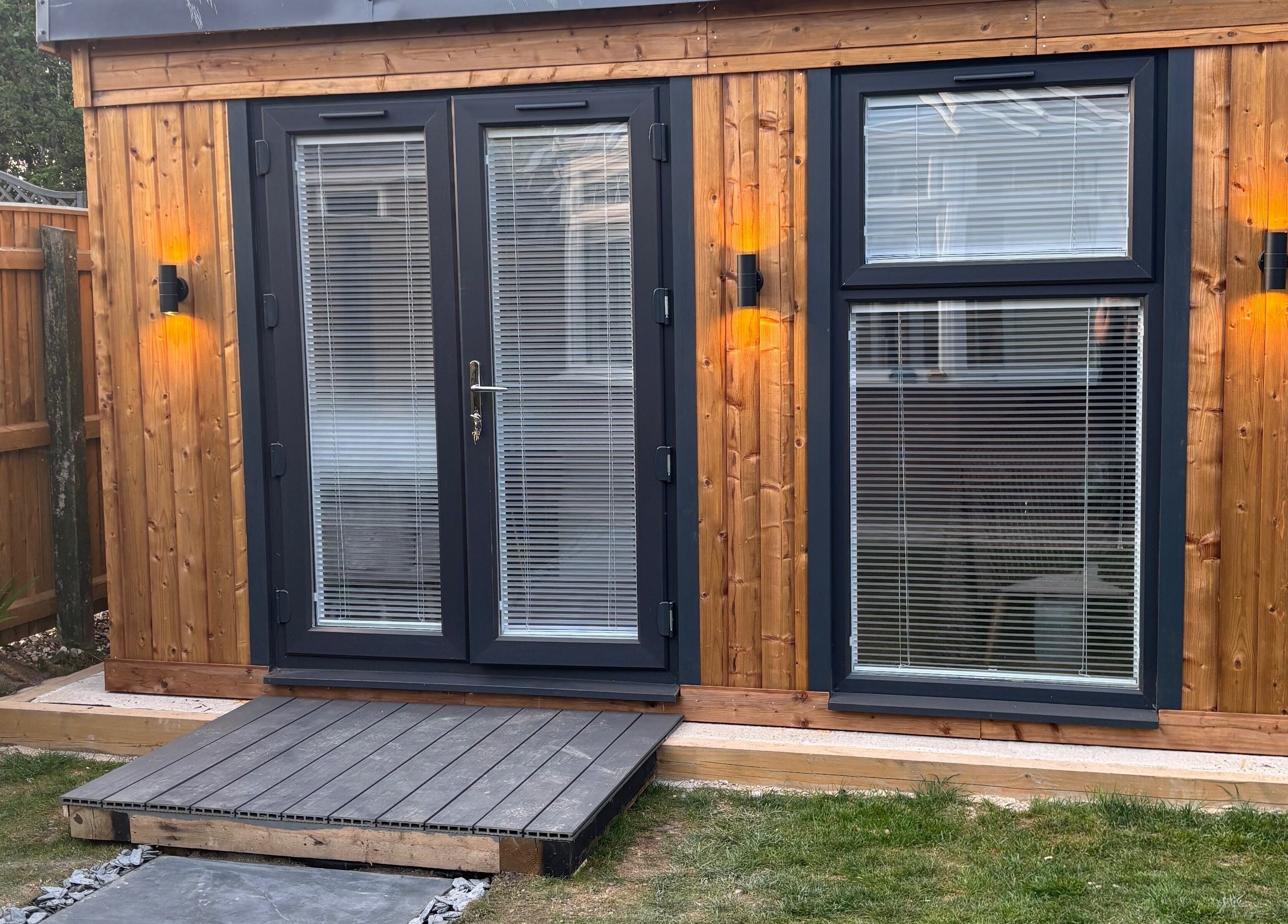 Elegant exterior of Glow Beauty by Lorna, Cleethorpes, England, GB featuring a cozy wooden cabin.