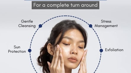 Person gently cleanses face, part of Habitual Beauty's holistic skincare in Cape Town, Western Cape, ZA.