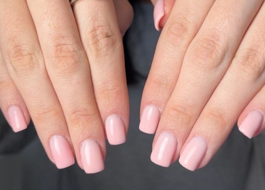 Elegant pink manicure at The Witchery in Glasgow, Scotland, GB, showcasing beautifully polished nails.