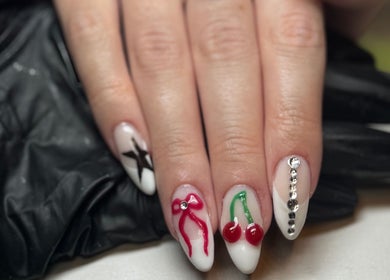Stylish nail art at Lvy Luxe Nails, Swindon, England. Intricate designs on well-manicured nails.