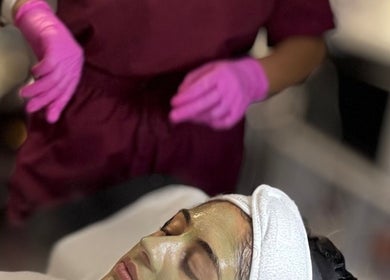 Customer enjoying a facial treatment at Diamond Glow, Malden, Massachusetts, US. Luxurious skincare service.