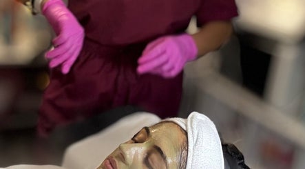 Customer enjoying a facial treatment at Diamond Glow, Malden, Massachusetts, US. Luxurious skincare service.
