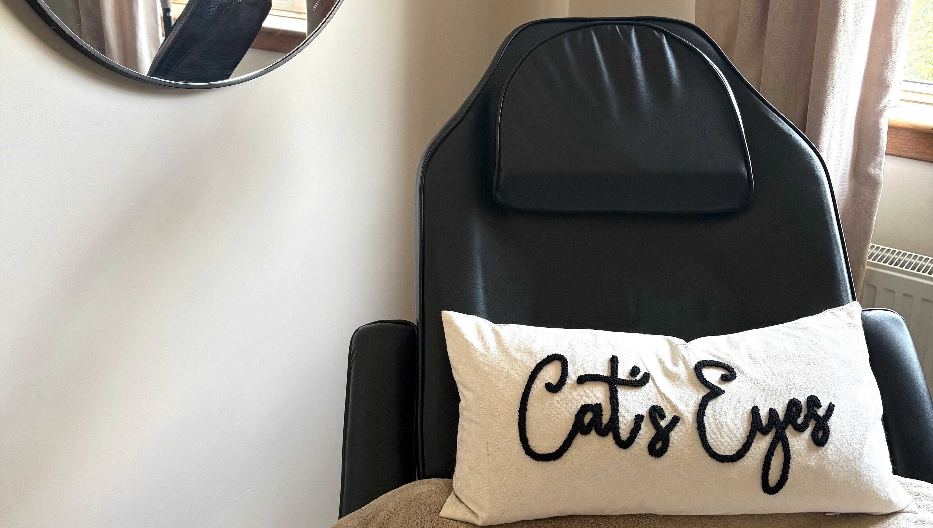 Relaxation chair with Cat's Eyes pillow at Cat’s Eyes, Kilbarchan, Scotland, GB.