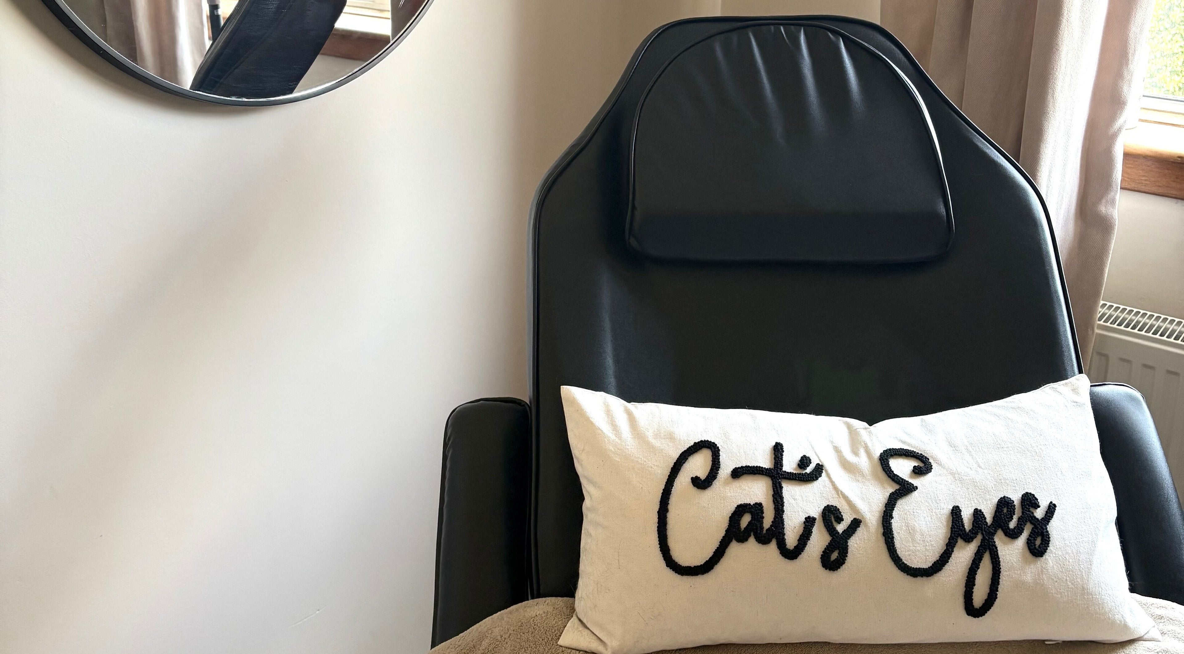 Relaxation chair with Cat's Eyes pillow at Cat’s Eyes, Kilbarchan, Scotland, GB.