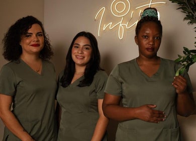Professional team at 8 Infiito Salon in Jeddah, Makkah Province, SA, showcasing their expertise and welcoming ambiance.