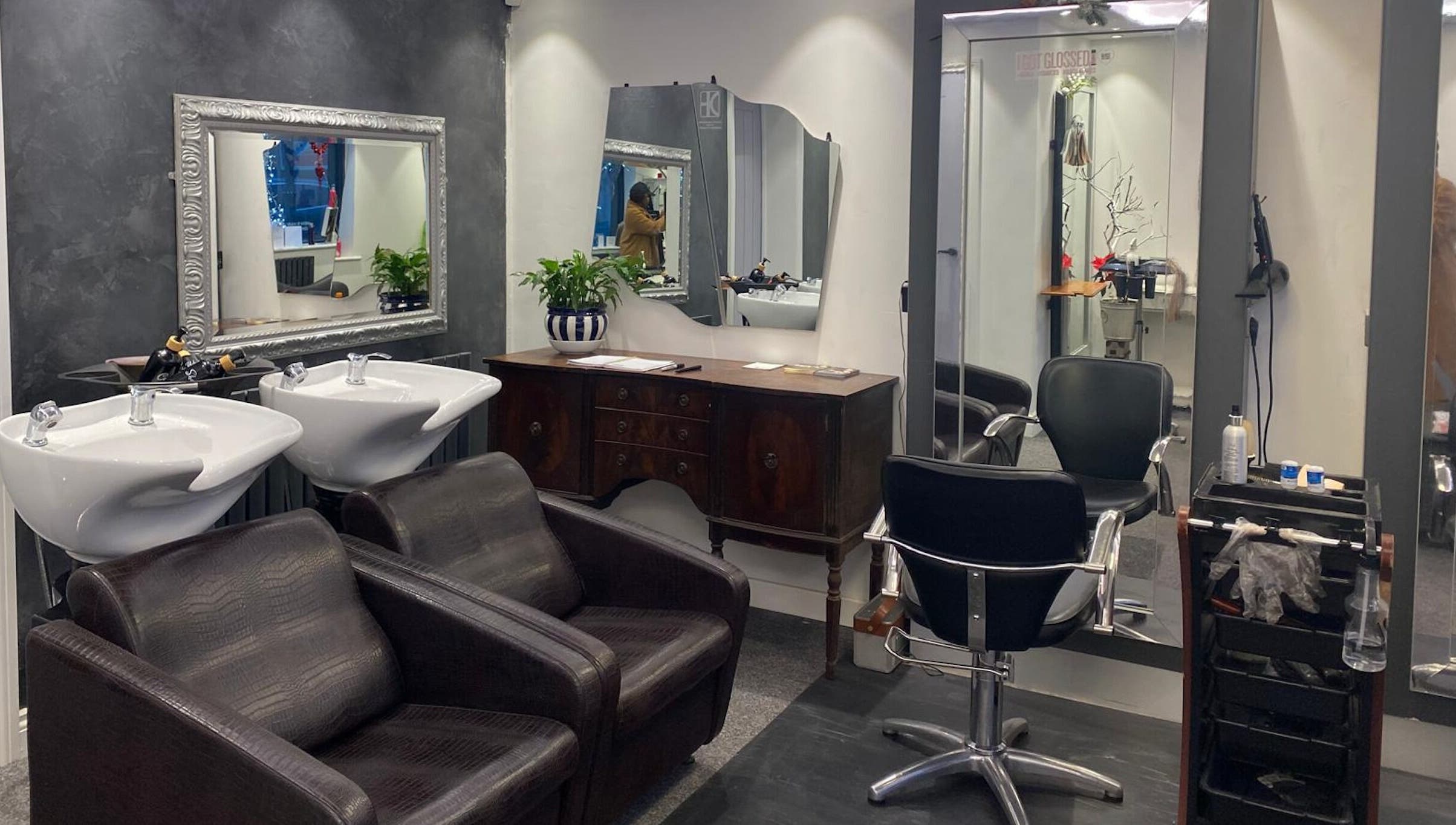 Elegant salon setup at DivaDazzle Hair Extensions, Denton, England, GB, featuring styling chairs and mirrors.