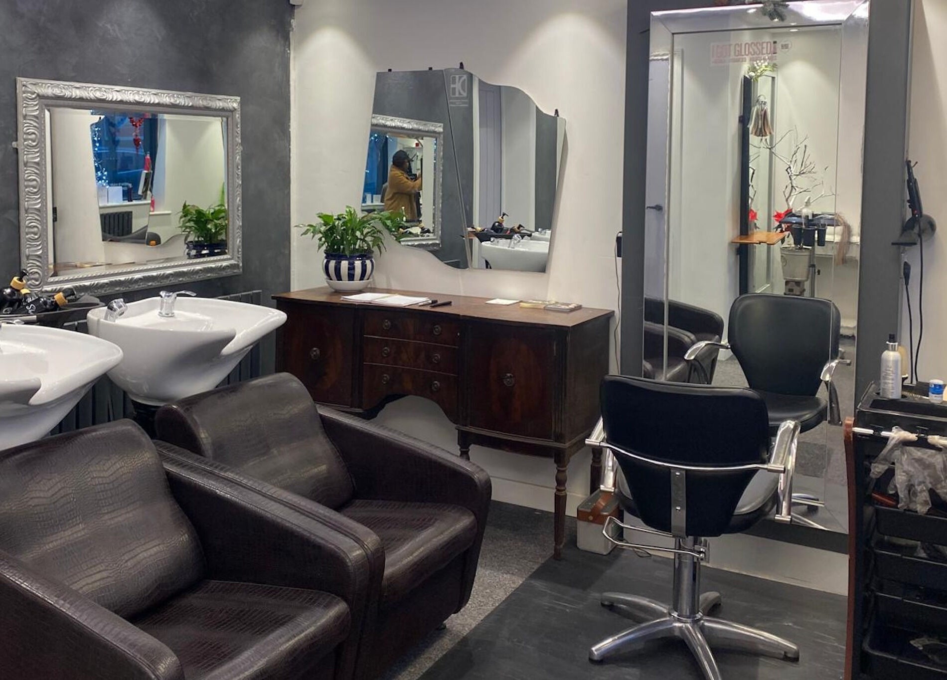 Elegant salon setup at DivaDazzle Hair Extensions, Denton, England, GB, featuring styling chairs and mirrors.