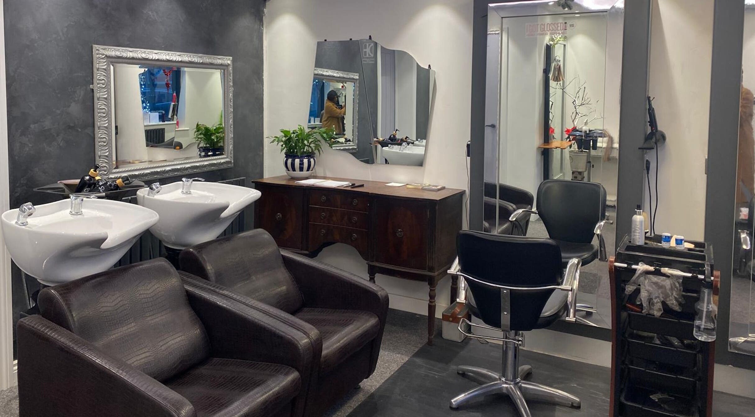 Elegant salon setup at DivaDazzle Hair Extensions, Denton, England, GB, featuring styling chairs and mirrors.