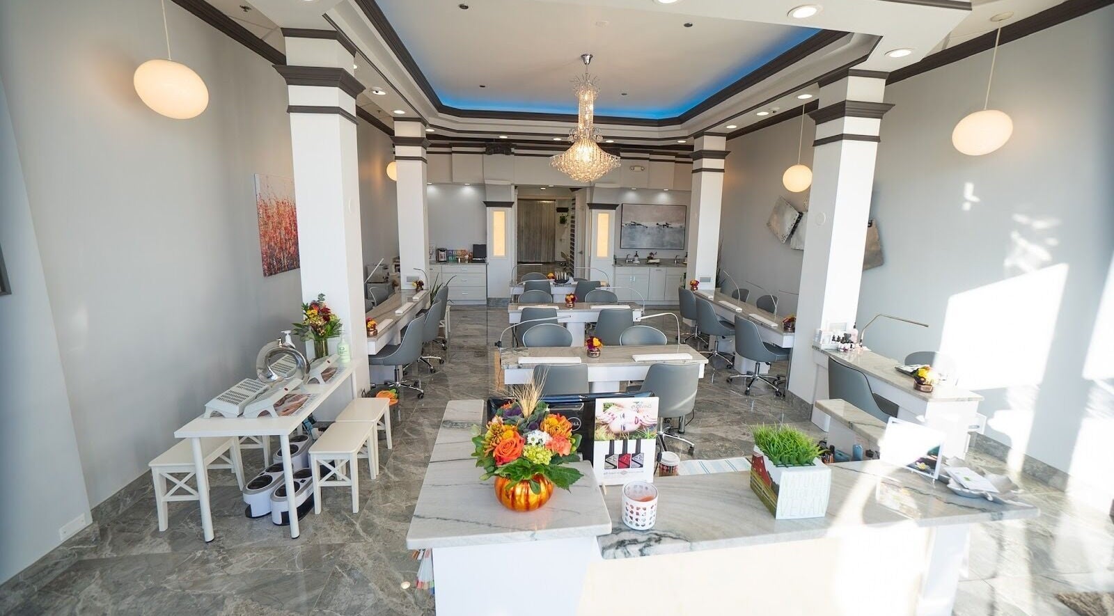 Spacious, chic interior of Organic Nails And Spa in Fairfax, VA, US, featuring stylish manicure stations.