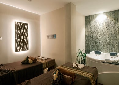 Relaxing spa room with twin beds at Spa Central Nagoya, Kepulauan Riau, Kepulauan Riau, ID.