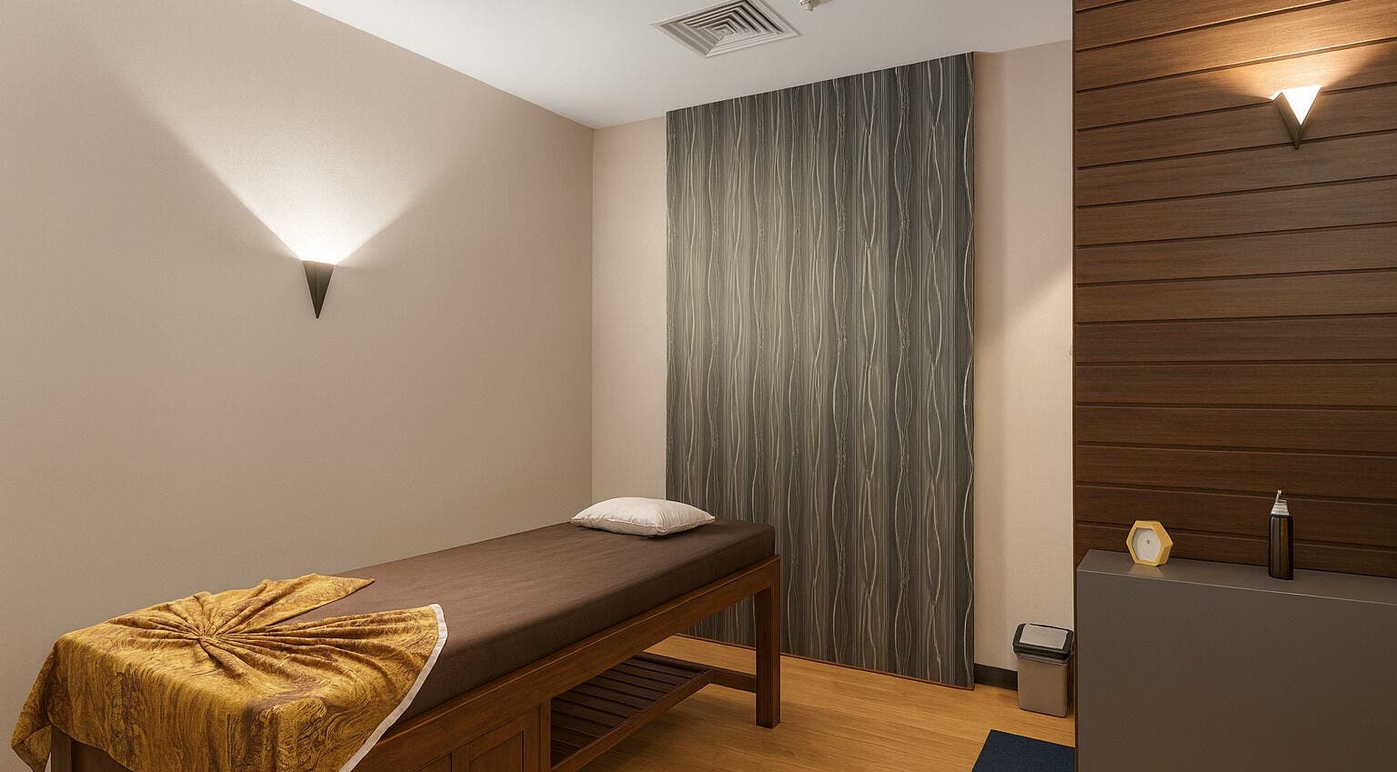 Relaxing massage room at Spa Central I Hotel Baloi, Kepulauan Riau, ID, featuring a serene ambiance.