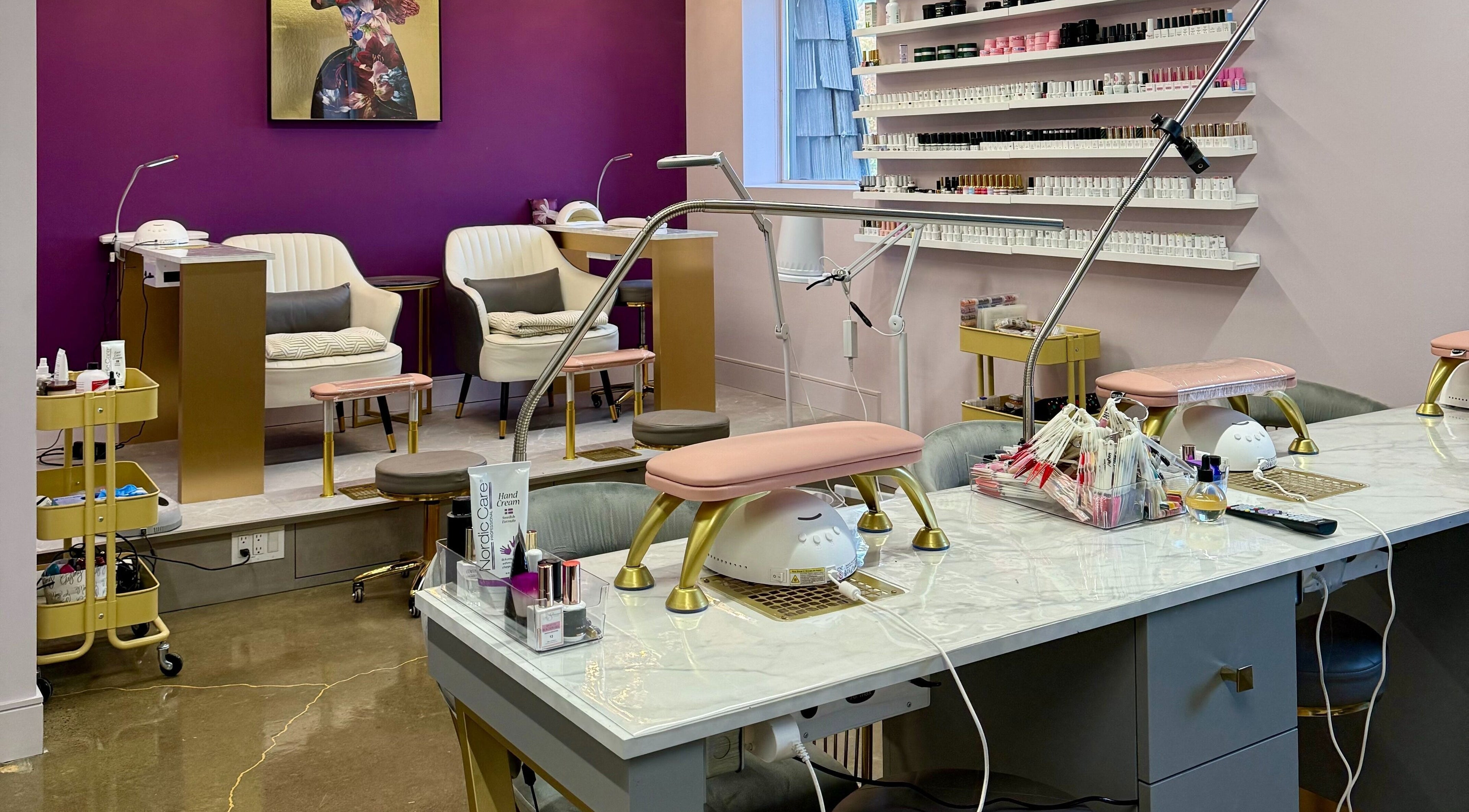 Interior of EuroFashion Beauty Salon, Mississauga, Ontario, CA, featuring modern nail care stations and vibrant decor.