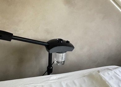 Professional therapy lamp in treatment room at Your Skin Club, Wakefield, England, GB.