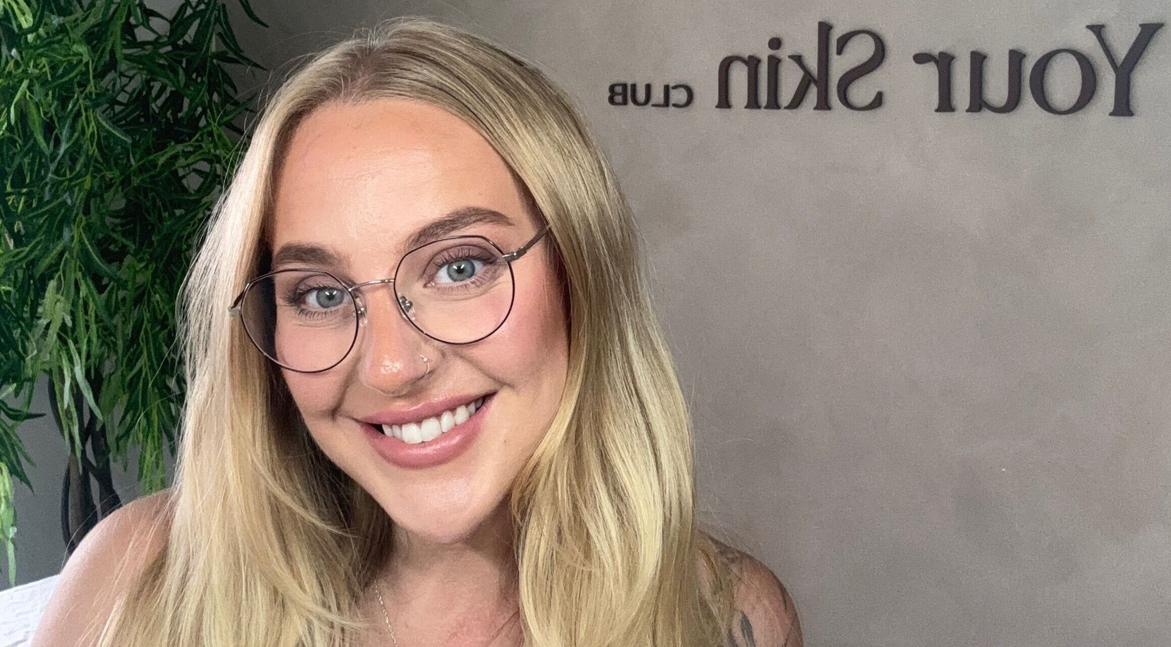 Smiling person at Your Skin Club in Wakefield, England, GB with welcoming ambiance.