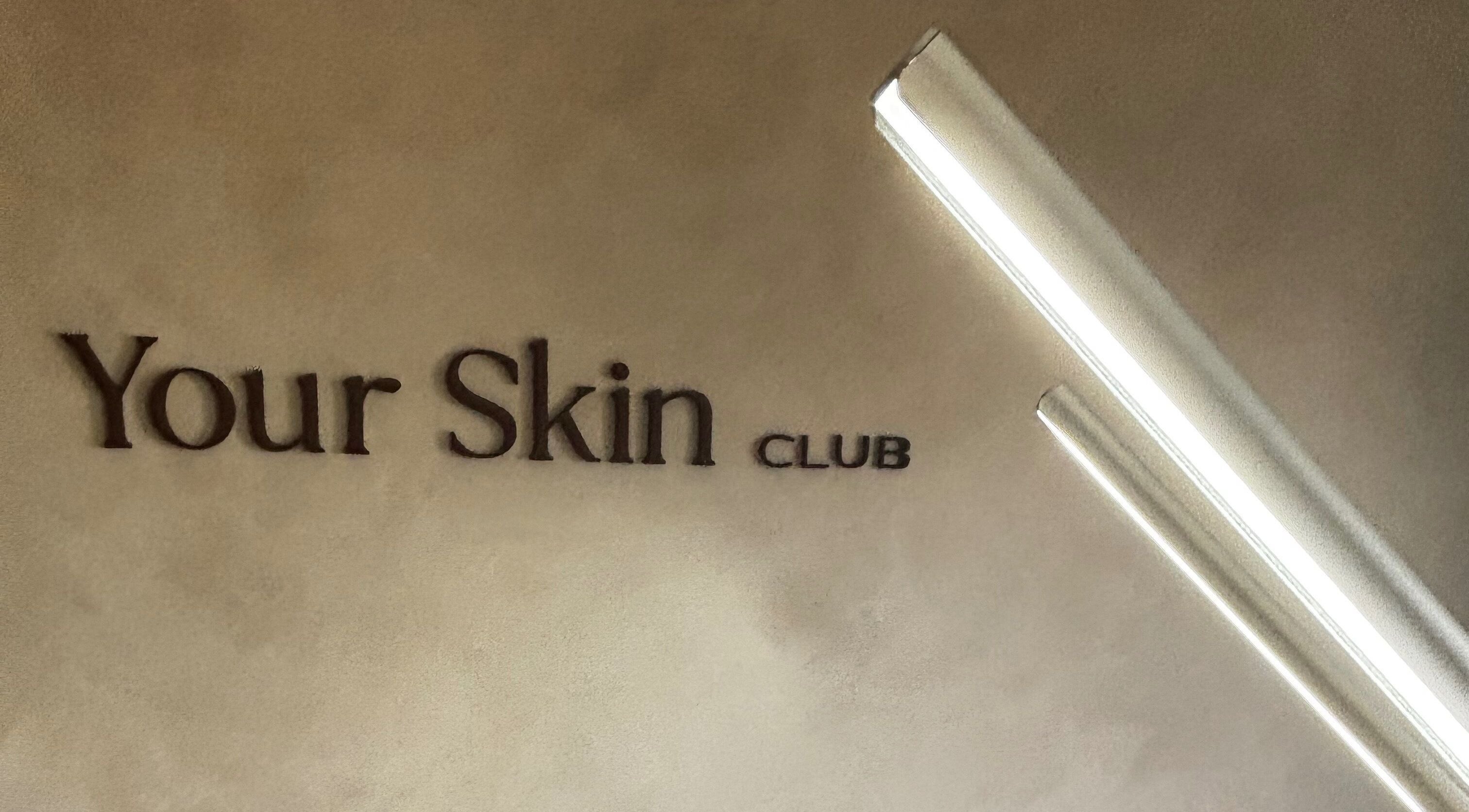 Elegant interior signage of Your Skin Club in Wakefield, England, GB with modern lighting.