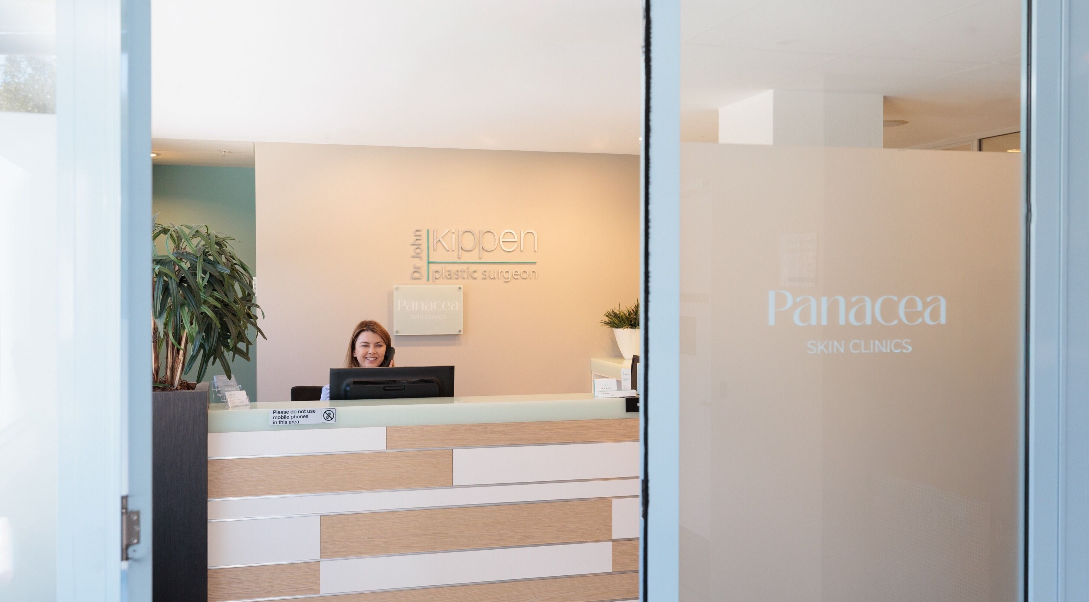 Panacea Skin Clinics reception area in Mona Vale, New South Wales, AU showcasing welcoming ambiance.